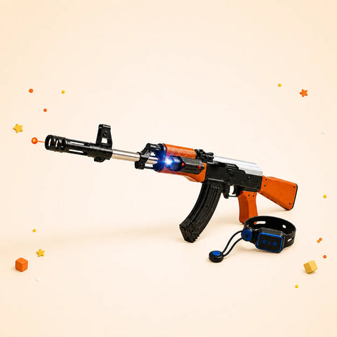 A toy rifle modeled after an AK-47, featuring a mix of black, silver, and wood-colored orange parts. A bright blue light shines from the front, and a gesture-sensing wrist controller sits beside it on a light beige background decorated with small stars and wooden blocks.