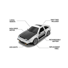 A white and black remote-controlled drift car with multiple callout lines and text labels explaining features like 2.4GHz remote, high-speed motor, drift tires included, rechargeable battery, LED lights, and replacement tires, on a plain white background.
