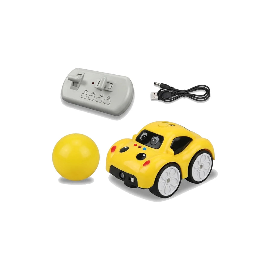 A yellow remote-controlled toy car with a front camera, shown with a gray remote control, a yellow ball, and a black USB charging cable on a white background.