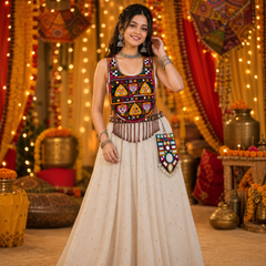 Model wearing the Dil Bharat hand-embroidered kanthi neck yoke over a cream lehenga at a festive Navratri setting